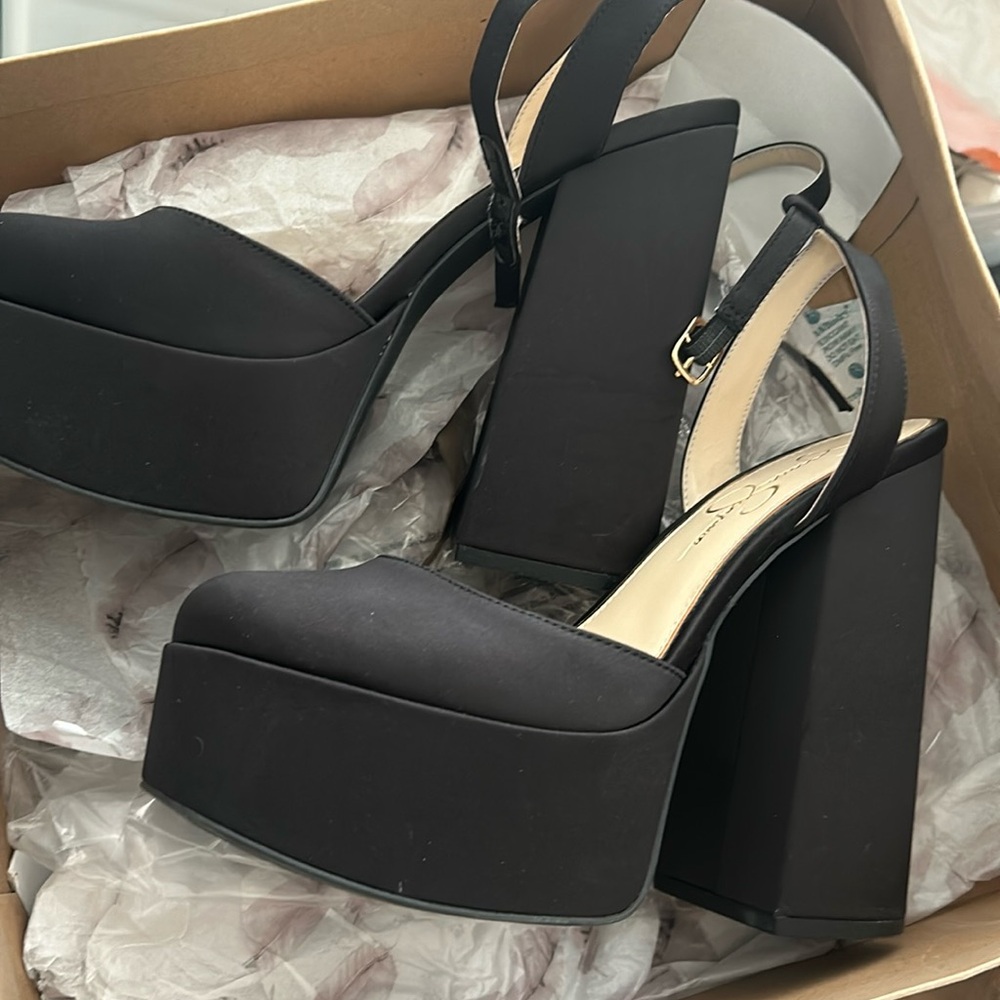 Jessica Simpson black matte satin platform heels 
Gently worn once 
Size 9